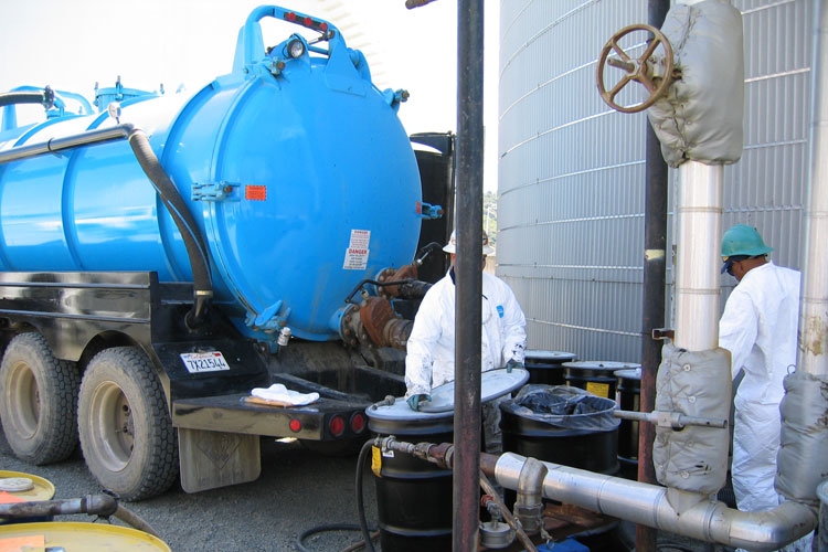 Vacuum truck transferring liquids in Pittsburg, CA
